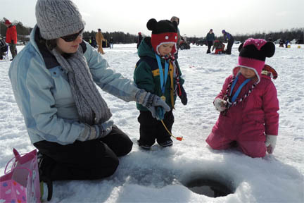 Mother and children ice fishing imabe.